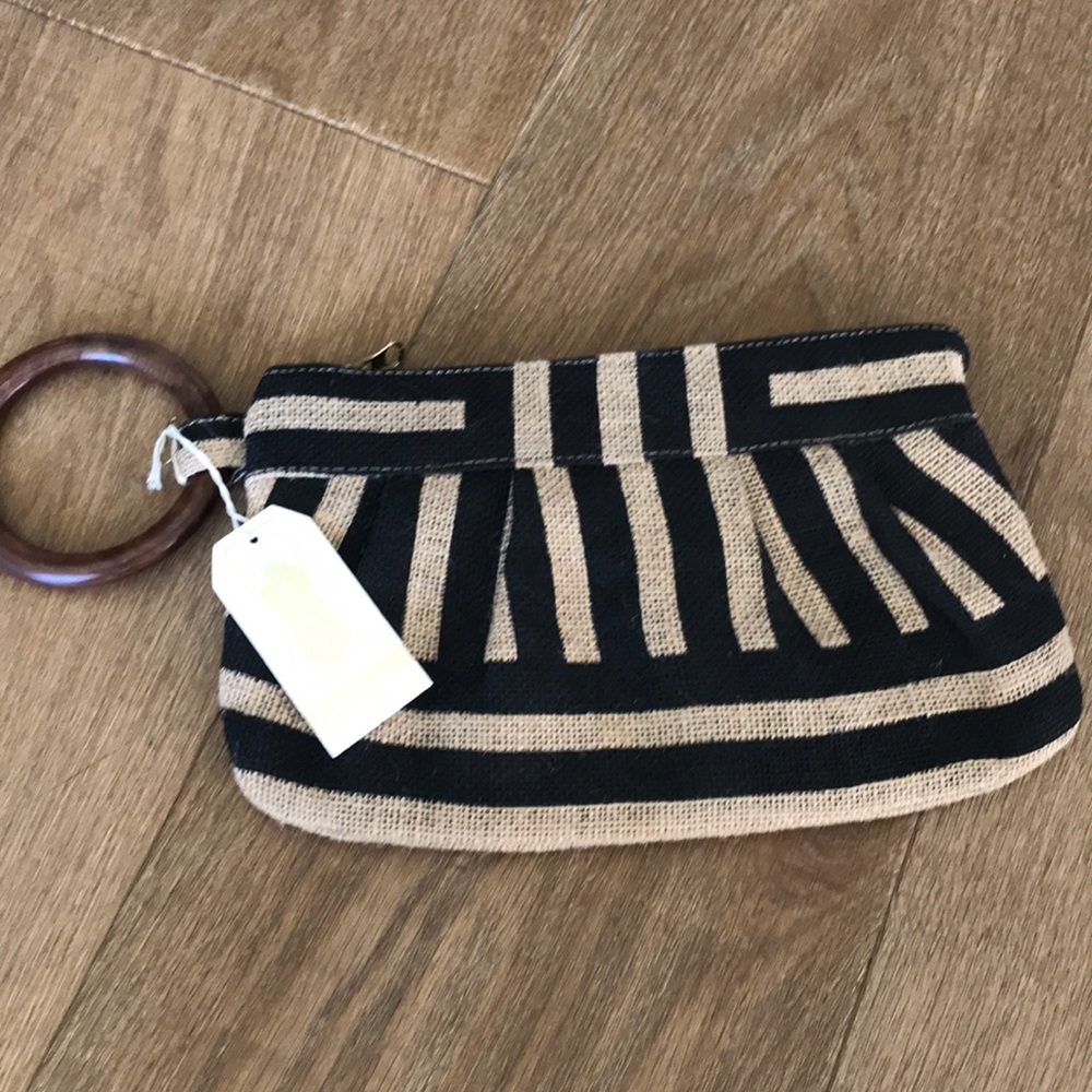 Mudpie wristlet clutch with tag